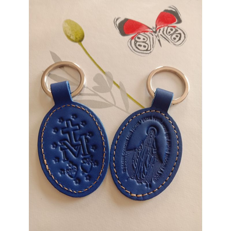 https://www.boutiques-theophile.com/4121-thickbox_default/porte-cles-en-cuir-bleu-fonce-motif-medaille-miraculeuse.jpg